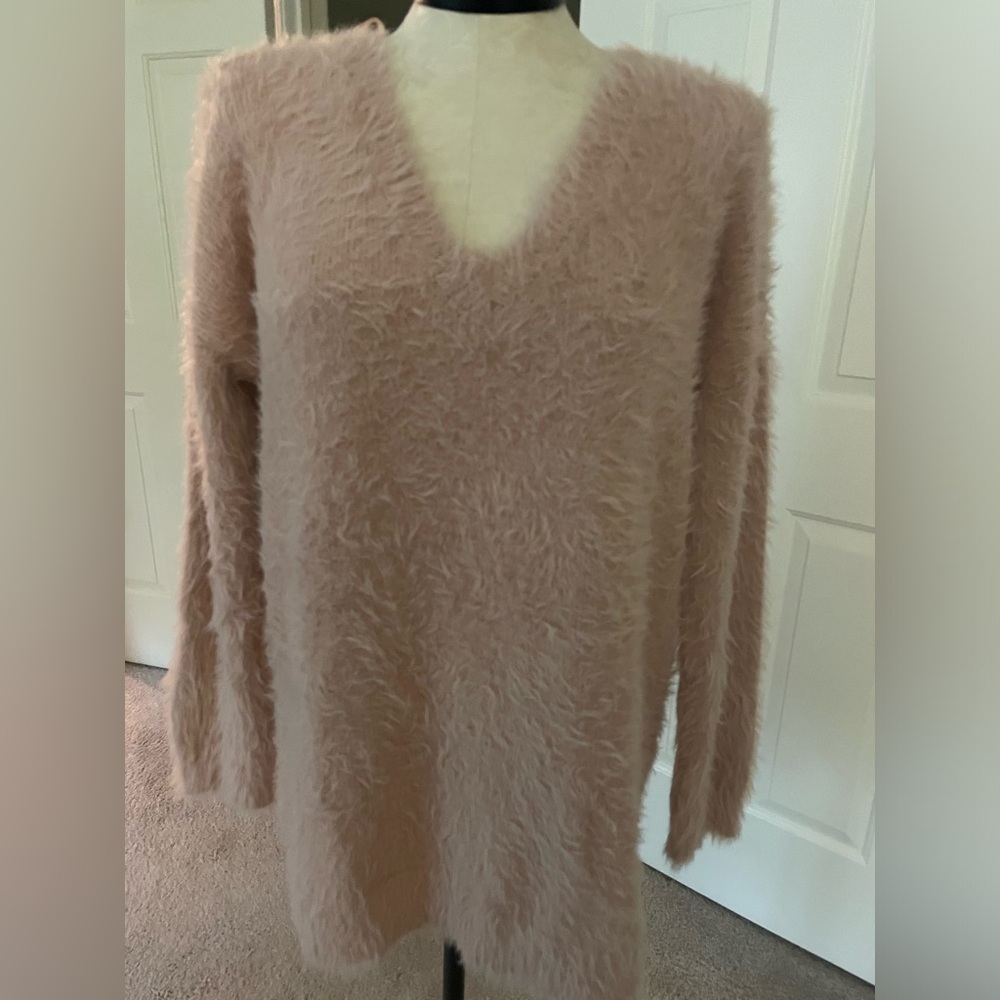 Ruby Moon eyelas sweater in a mauve pink color